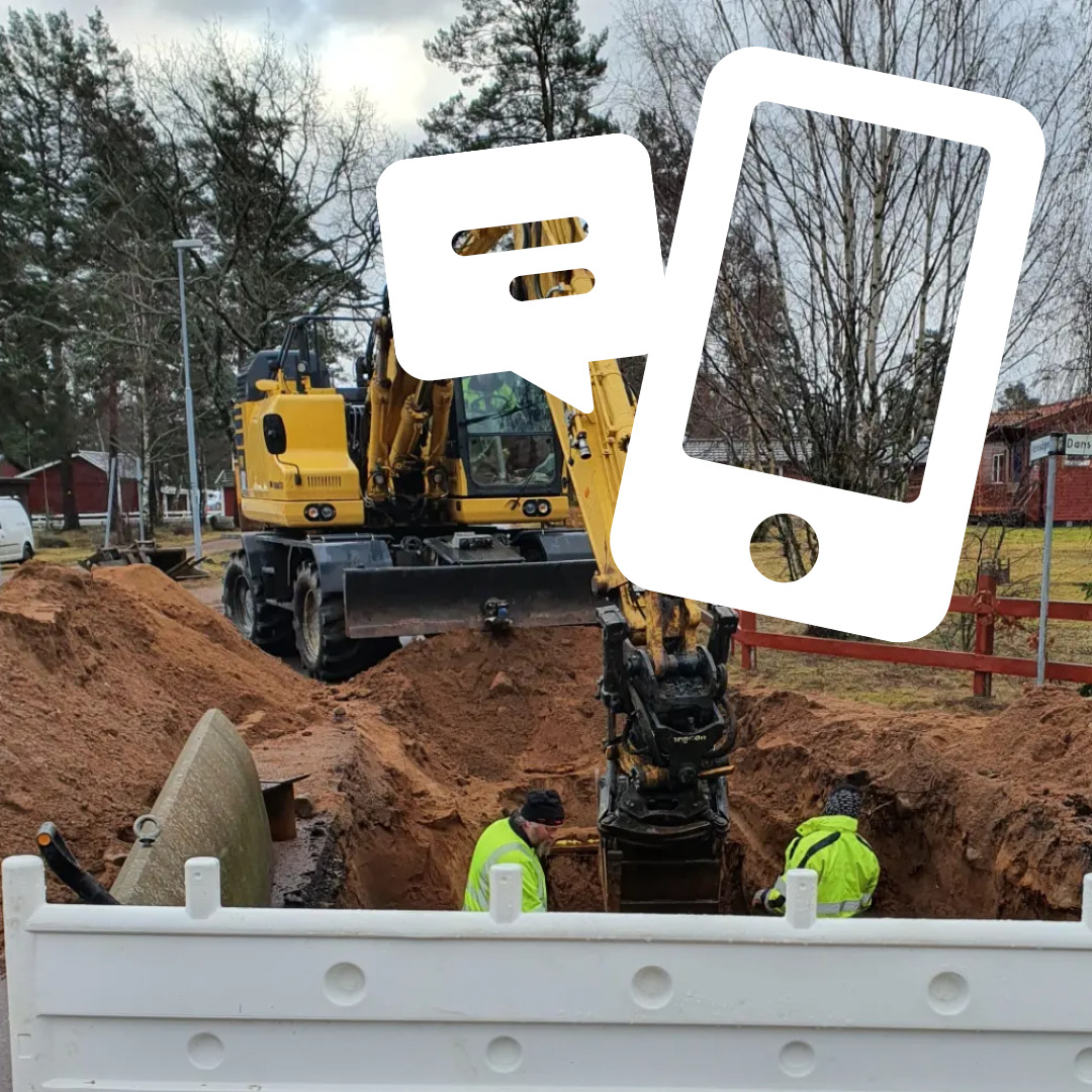 Vägarbete. Grävmaskin gräver i ett bostadsområde.