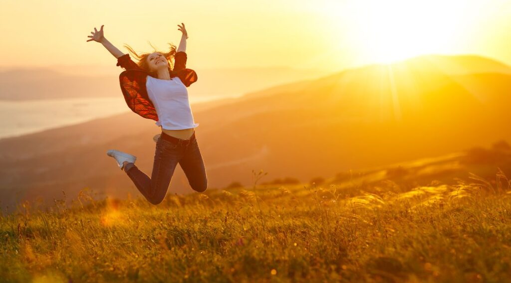Affischbild med människa som hoppar av lycka
